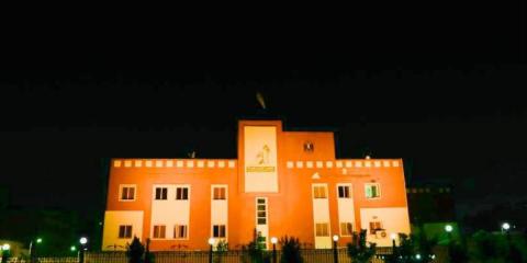 القومي لمرأة يضيء بـ "البرتقالي" بيوم القضاء على العنف ضد المرأة 